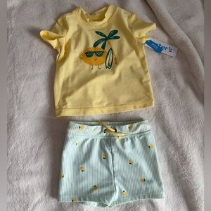 Carter's Swimsuit for baby size 9 months with tags never worn